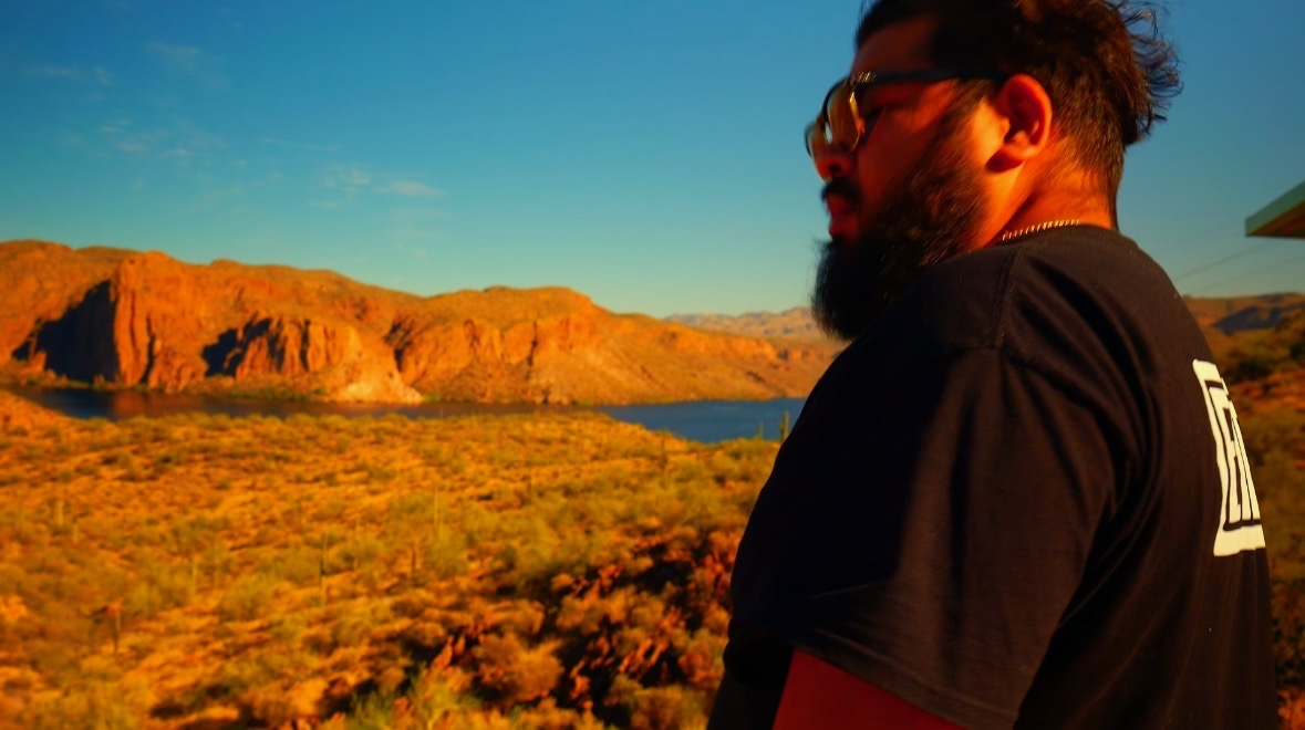 SERGIK in desert landscape at golden hour overlooking Phoenix