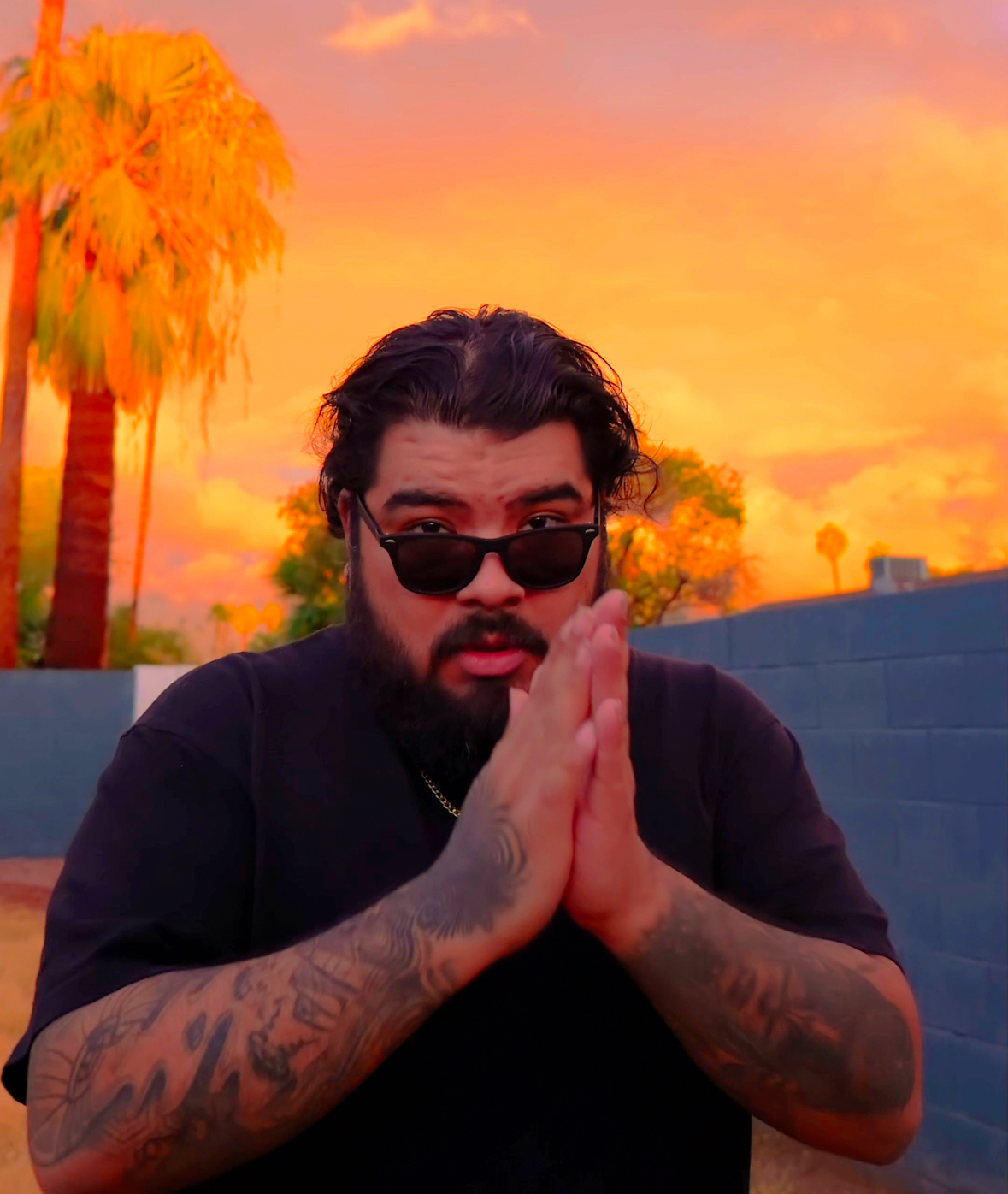 SERGIK performing with intense green stage lighting and geometric elements