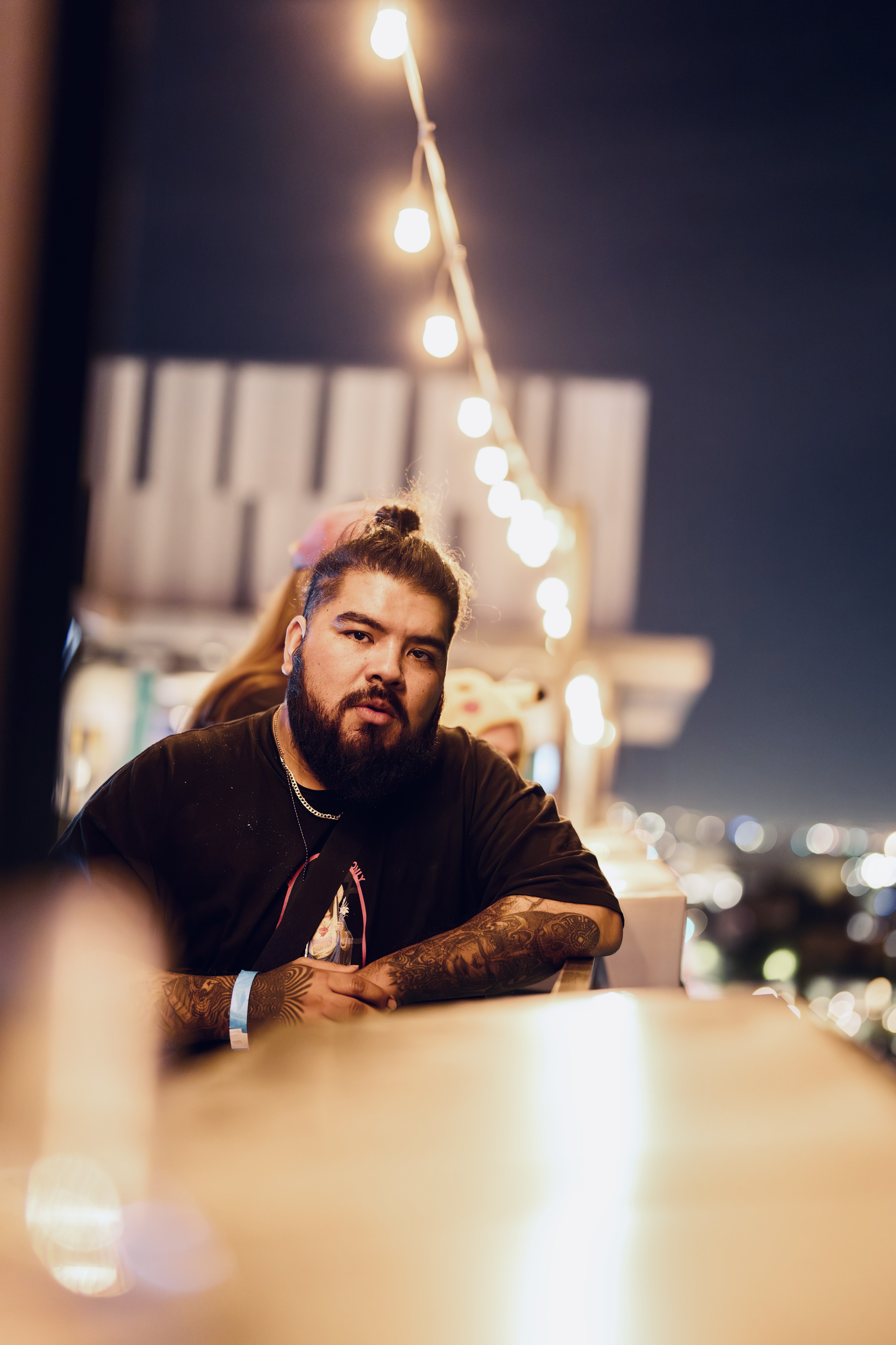 SERGIK in studio with red and yellow LED lighting